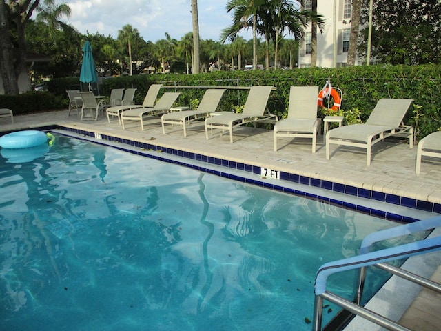 community pool featuring a patio