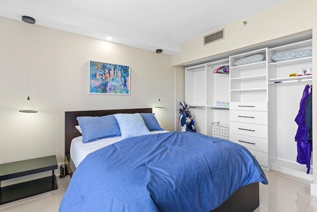 bedroom featuring visible vents