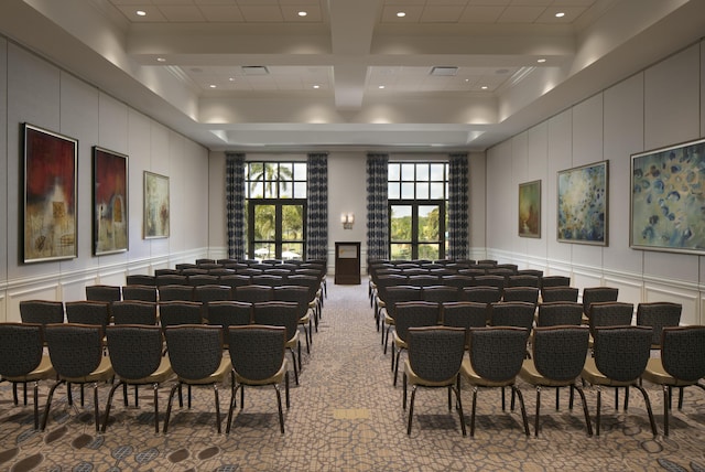 interior space with recessed lighting, a decorative wall, coffered ceiling, ornamental molding, and beam ceiling