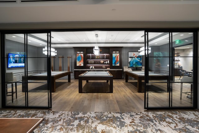 game room with recessed lighting, pool table, and wood finished floors