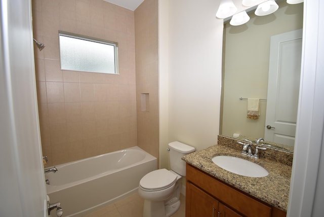 full bath with shower / tub combination, tile patterned flooring, vanity, and toilet