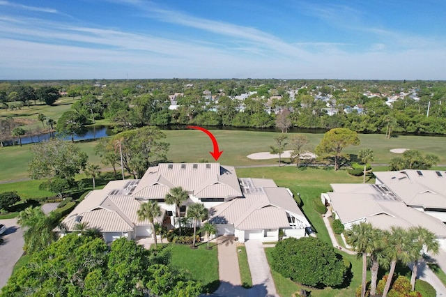 birds eye view of property with a residential view and a water view