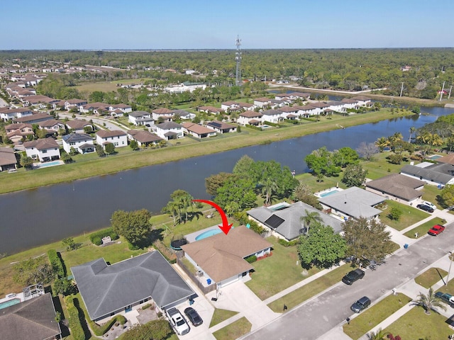 aerial view featuring a residential view and a water view