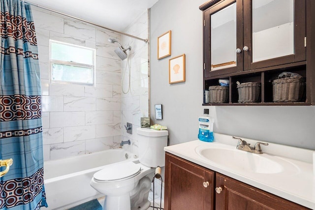 full bath with shower / bath combo, vanity, and toilet