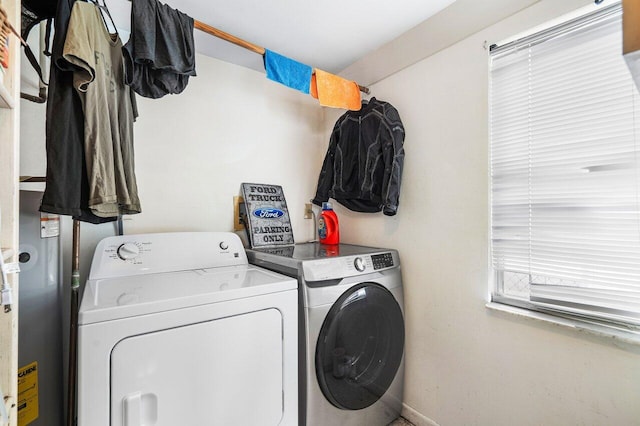 laundry area with washing machine and dryer and laundry area