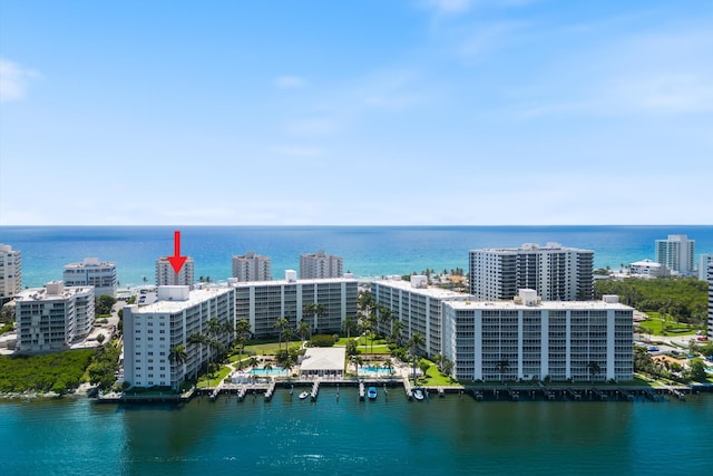 aerial view featuring a water view and a view of city