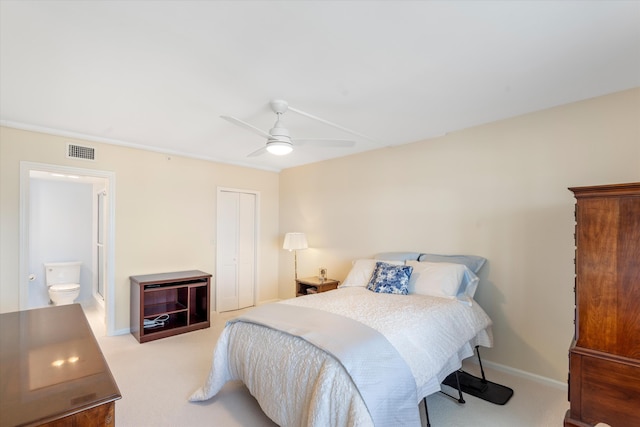 bedroom with carpet floors, a closet, visible vents, ceiling fan, and baseboards