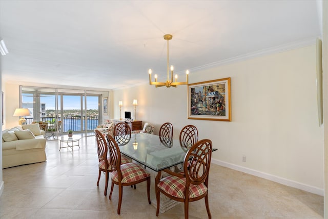 dining area featuring a notable chandelier, crown molding, baseboards, and light tile patterned floors