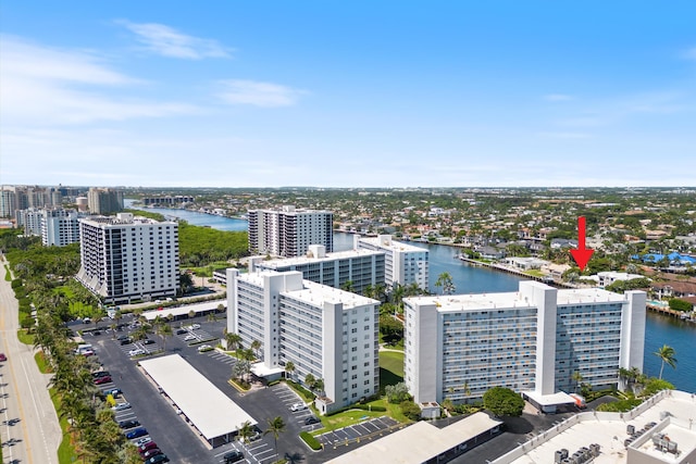 drone / aerial view with a water view and a city view