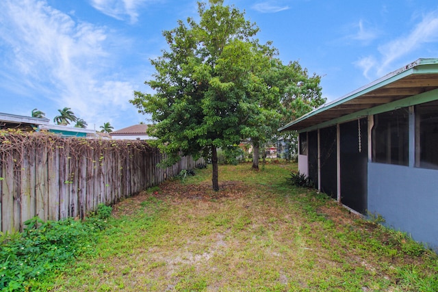 view of yard with fence