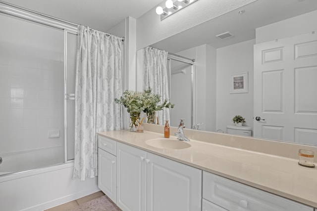 full bath with visible vents, toilet, tile patterned flooring, shower / bath combo with shower curtain, and vanity