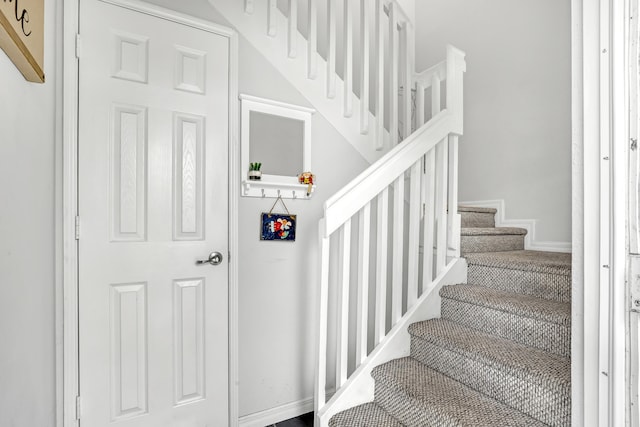 stairway with baseboards