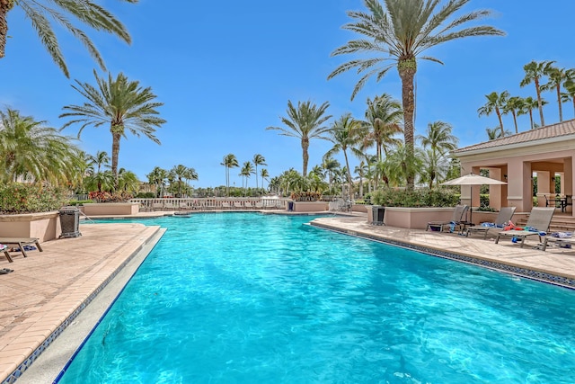 community pool with a patio