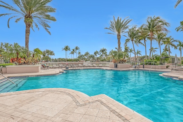 pool with a patio area