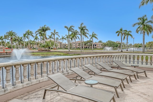 view of patio / terrace with a water view