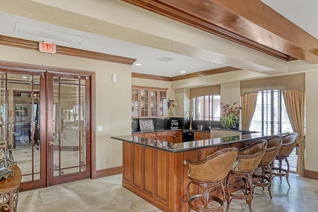 bar featuring light tile patterned floors, baseboards, dishwasher, ornamental molding, and french doors