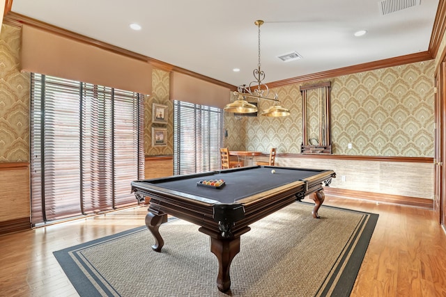 game room with ornamental molding, visible vents, and wallpapered walls