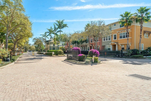 surrounding community with a gate, a residential view, and fence