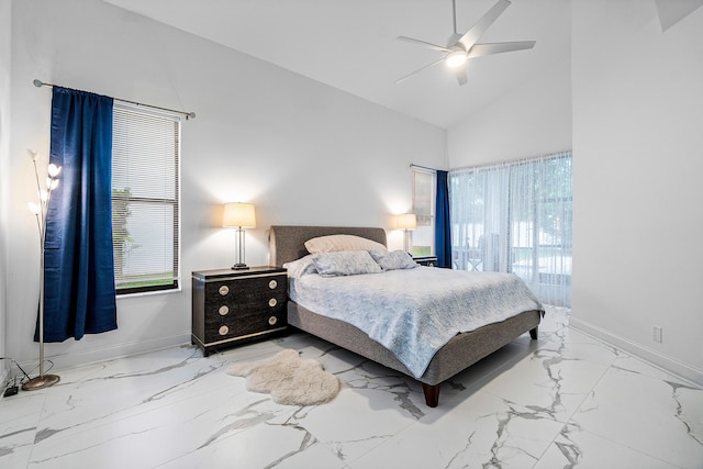 bedroom featuring marble finish floor, ceiling fan, baseboards, and high vaulted ceiling