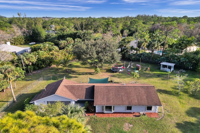 drone / aerial view with a forest view