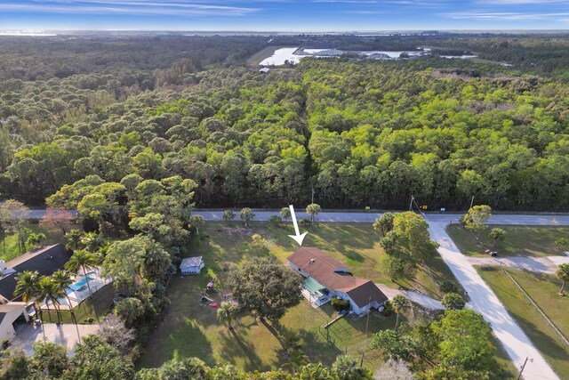 aerial view featuring a forest view