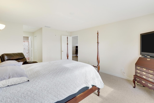 bedroom with carpet flooring, visible vents, and baseboards