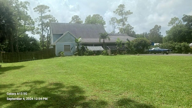 view of yard featuring fence