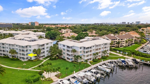 aerial view featuring a water view and a city view