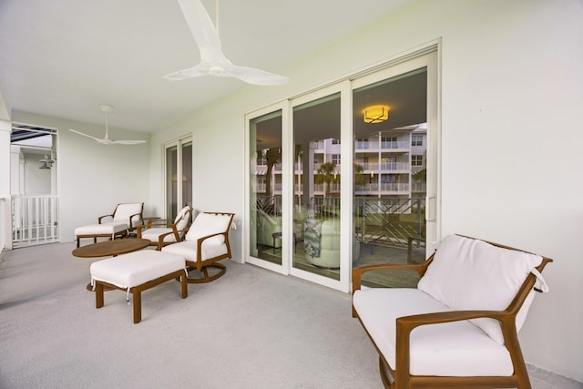 sunroom with a ceiling fan