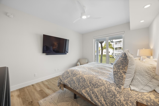 bedroom featuring ceiling fan, recessed lighting, wood finished floors, baseboards, and access to exterior