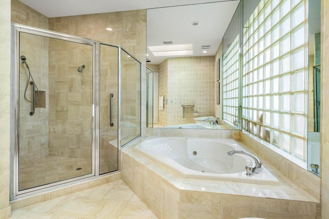 full bath with a jetted tub, a shower stall, and visible vents