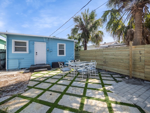 view of patio / terrace with outdoor dining space and a fenced backyard