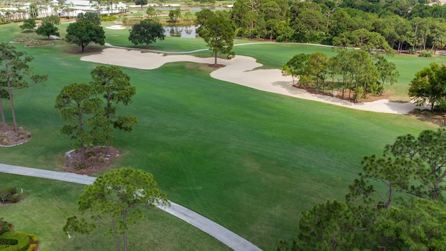 birds eye view of property with golf course view