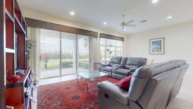 living room featuring recessed lighting, visible vents, a ceiling fan, and light tile patterned flooring