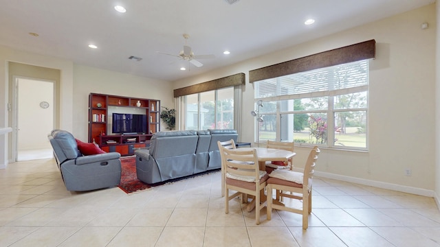 dining area featuring light tile patterned floors, ceiling fan, baseboards, and recessed lighting