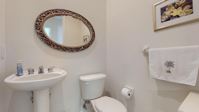 half bathroom with toilet