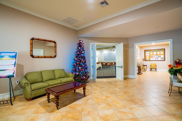 living room featuring light tile patterned floors, baseboards, visible vents, and crown molding