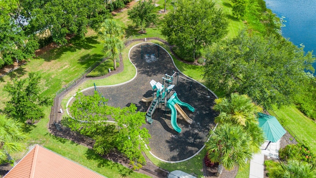 birds eye view of property with a water view