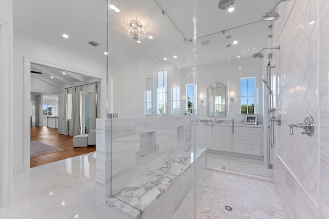 bathroom featuring a shower, recessed lighting, visible vents, and vanity