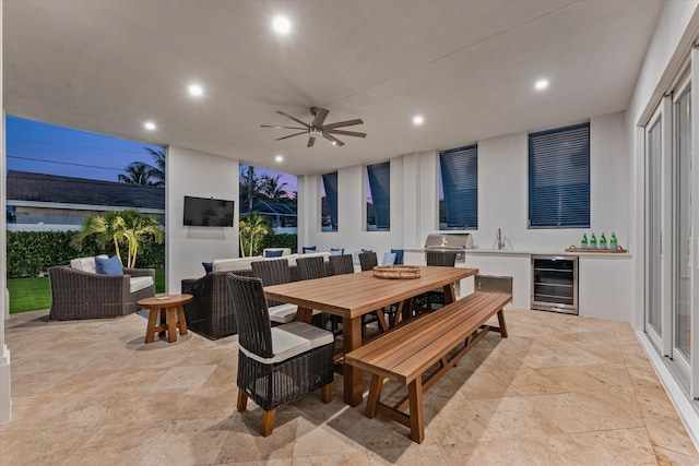 dining space with wine cooler, ceiling fan, and recessed lighting