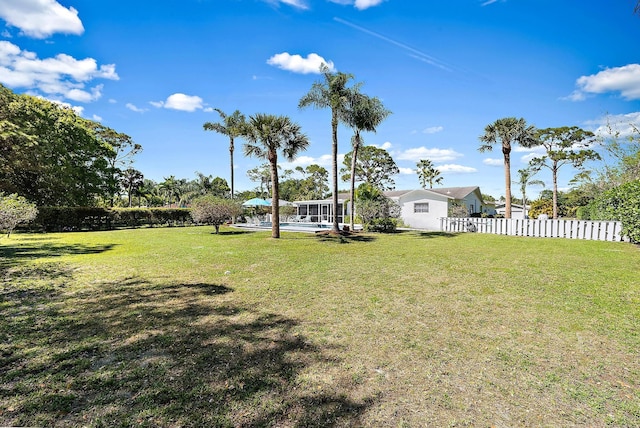 view of yard with fence