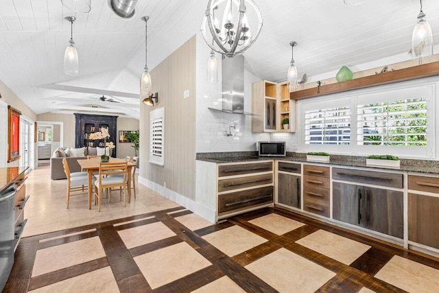 kitchen with baseboards, dishwashing machine, wall chimney exhaust hood, vaulted ceiling, and open shelves