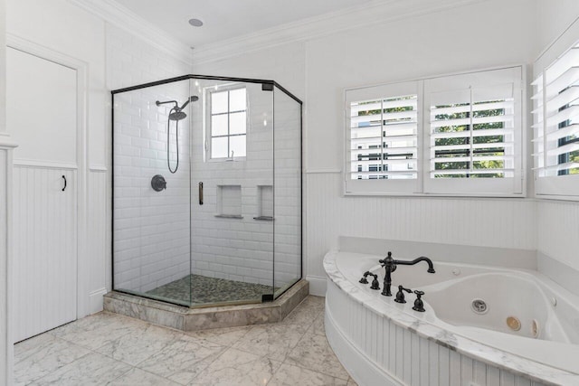 full bath with marble finish floor, a wainscoted wall, ornamental molding, a shower stall, and a tub with jets