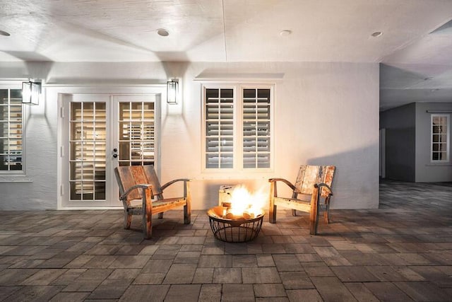 view of patio / terrace with an outdoor fire pit