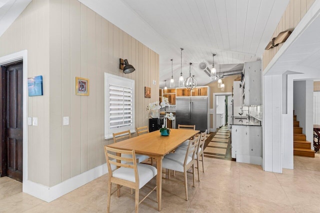 dining area featuring lofted ceiling, wood ceiling, light tile patterned flooring, and stairway