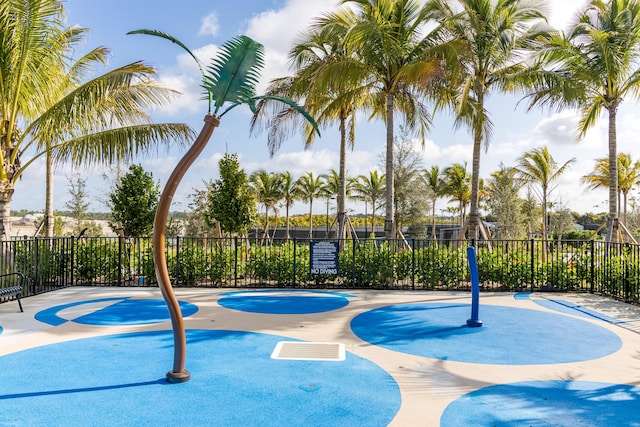 surrounding community with community basketball court and fence