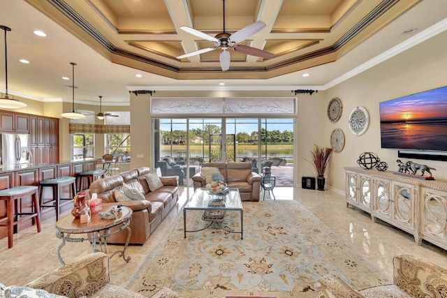 living room featuring crown molding, coffered ceiling, a ceiling fan, and a healthy amount of sunlight