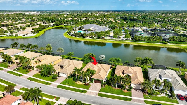 aerial view featuring a water view and a residential view