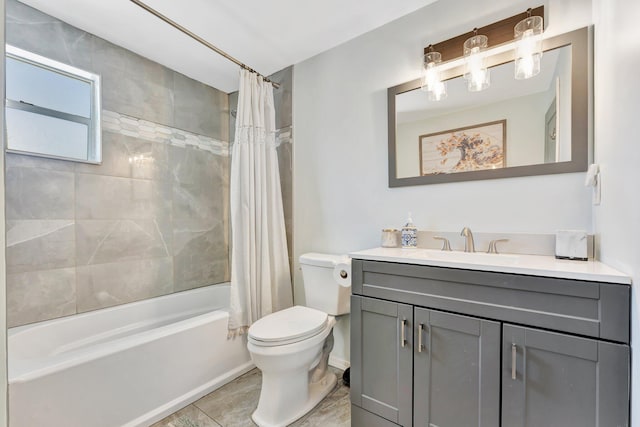 full bath featuring shower / tub combo, vanity, and toilet