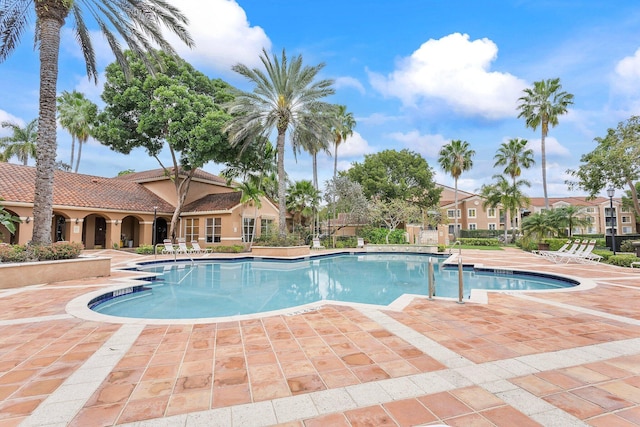 pool featuring a patio area